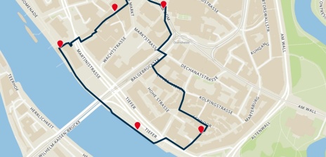 Auf einer Karte ist eine Route eingezeichnet. Entlang der Route finden sich rote Stecknadelsymbole.