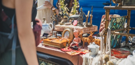 A flea market stall with various bric-a-brac.