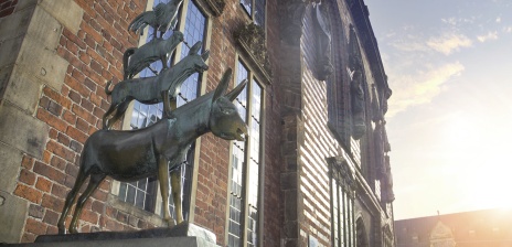 The Bremen Town Musicians. The Ratskeller building can be seen in the background.