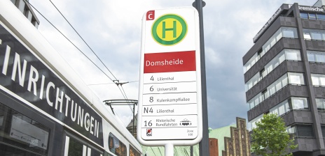 A bus stop sign on Domsheide. 