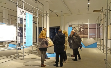 Visitors inform themselves about the Denkort Bunker Valentin. 