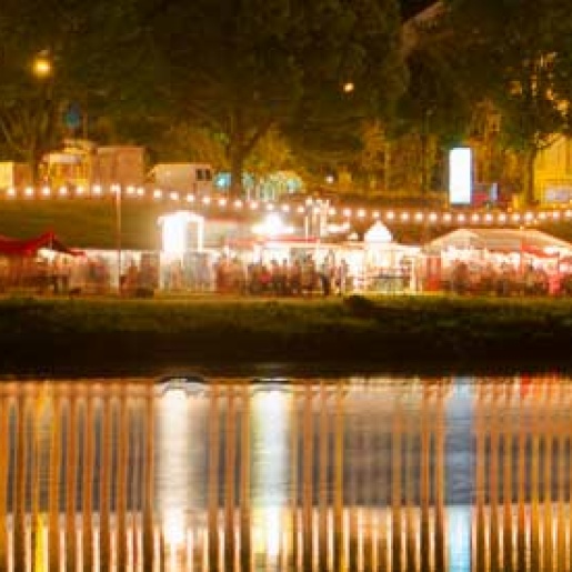 View of brightly lit festival tents