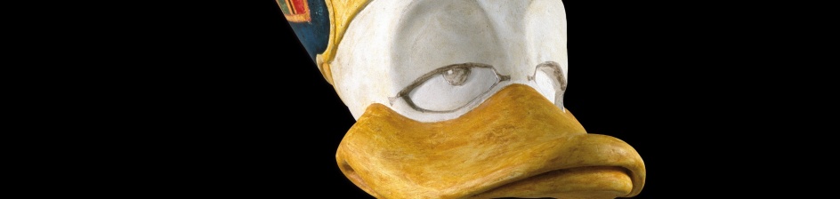 Eine Ente im Stil der Donald Duck Comics, die als Pharao dargestellt wird.