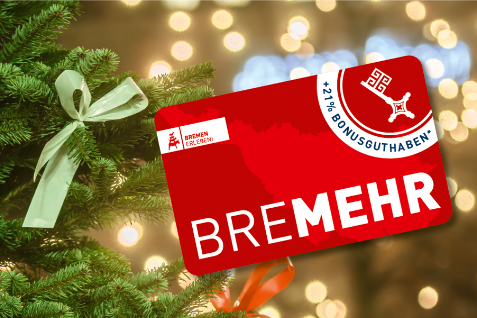 Der BreMEHR-Gutschein vor einem weihnachtlichen Hintergrund