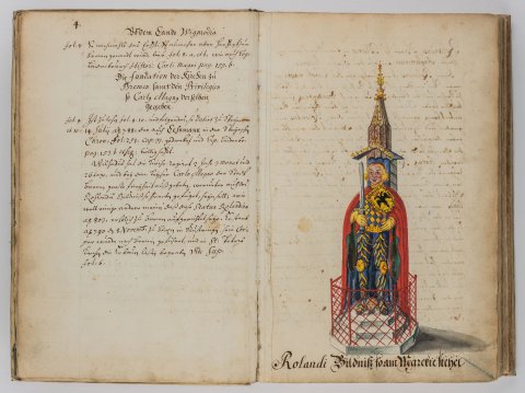 Ein aufgeschlagenes Buch mit einem Bild vom Roland und Text