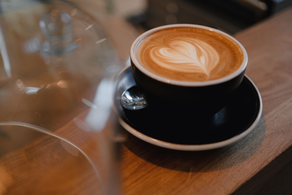 There's a cappuccino on the table.